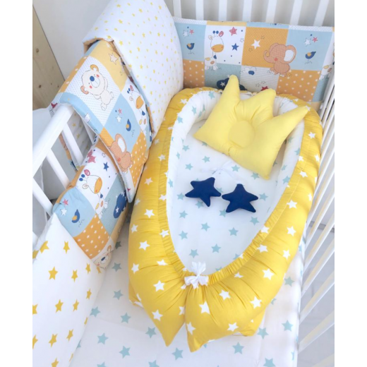 طقم سرير أطفال حديثي الولادة من أنيت ، أصفر وأبيض مع نجوم زرقاء